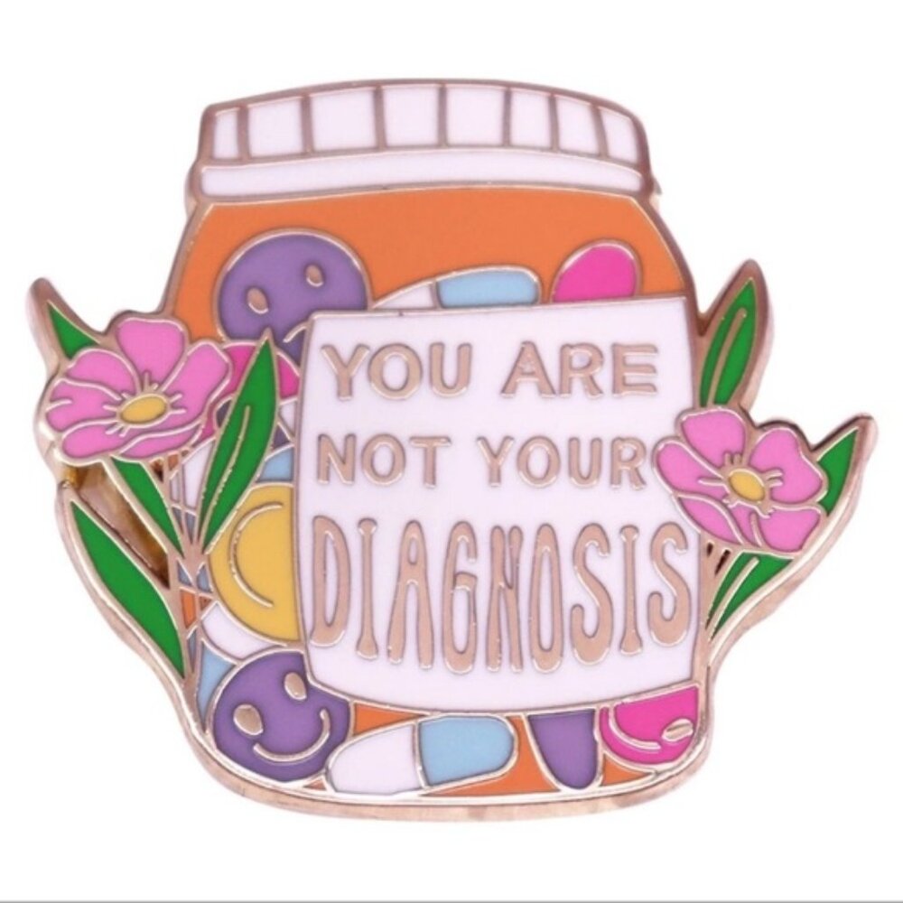 You Are Not Your Diagnosis Enamel Pin Colourful Floral and Orange Pill